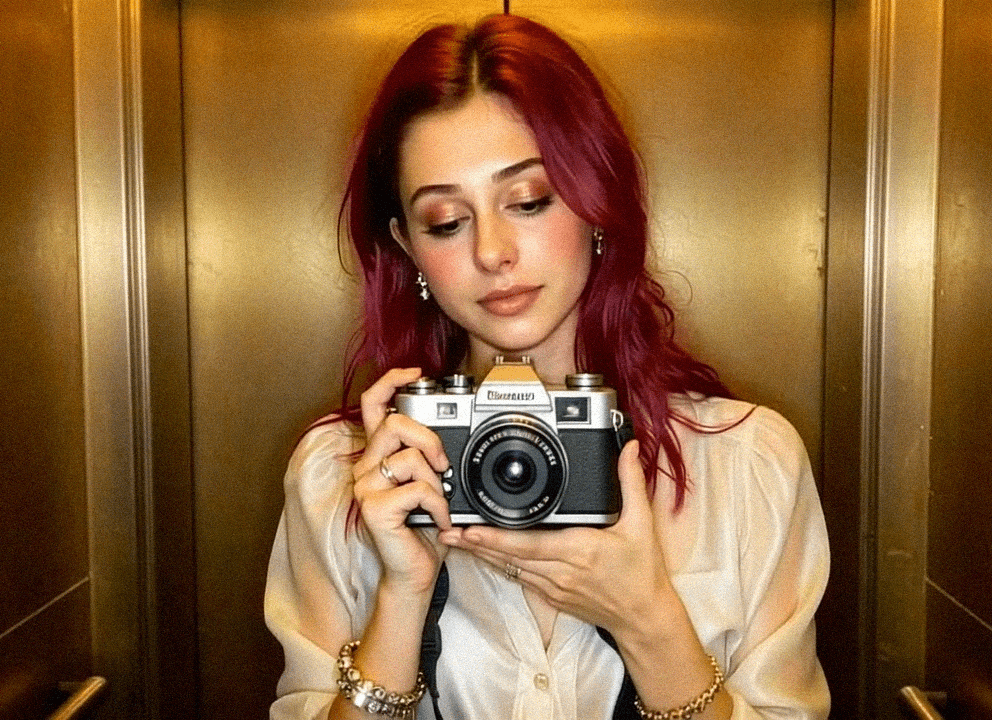Emma-Jane MacKinnon-Lee taking a photo from the 23rd floor of a chilean apartment